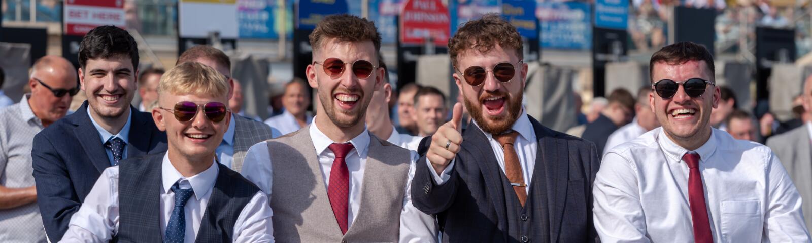 Lads over track fence