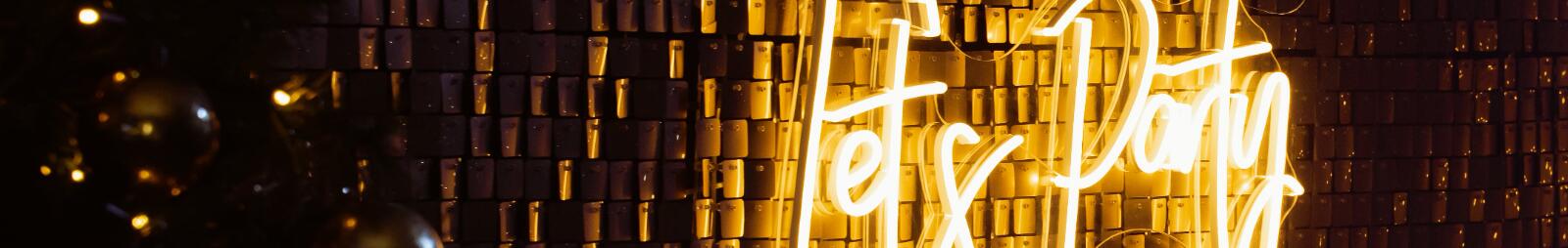 A neon lets party sign