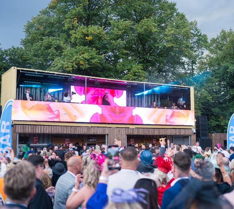 Gok Wan performing at the 2025 Betfred St Leger Ladies Day 