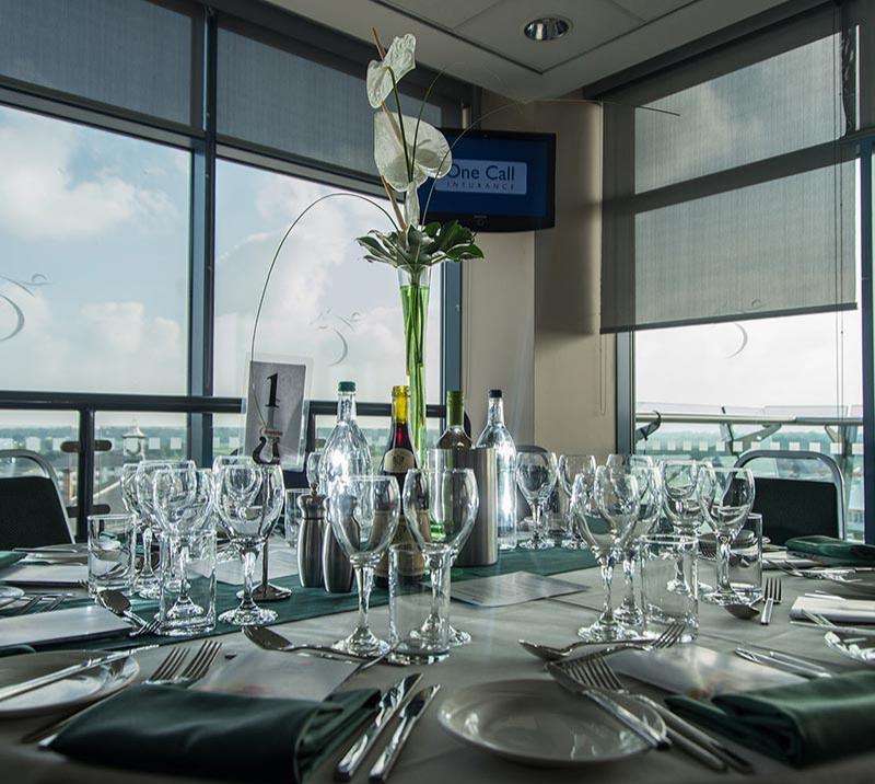 A table set with glasses ready for a celebration at Doncaster Racecourse