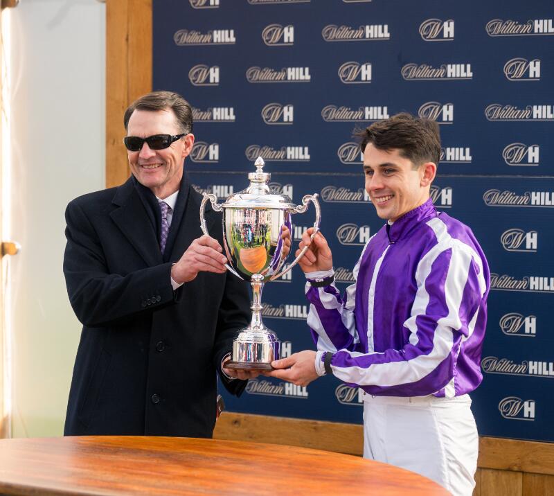 Aidan O Brien and Ronan Whelan holding the Futurity Trophy 