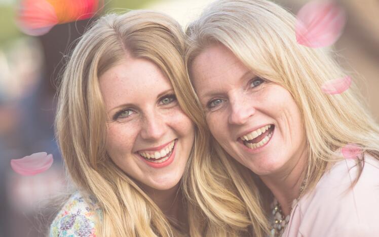 Mother and daughter enjoy a day out at the races