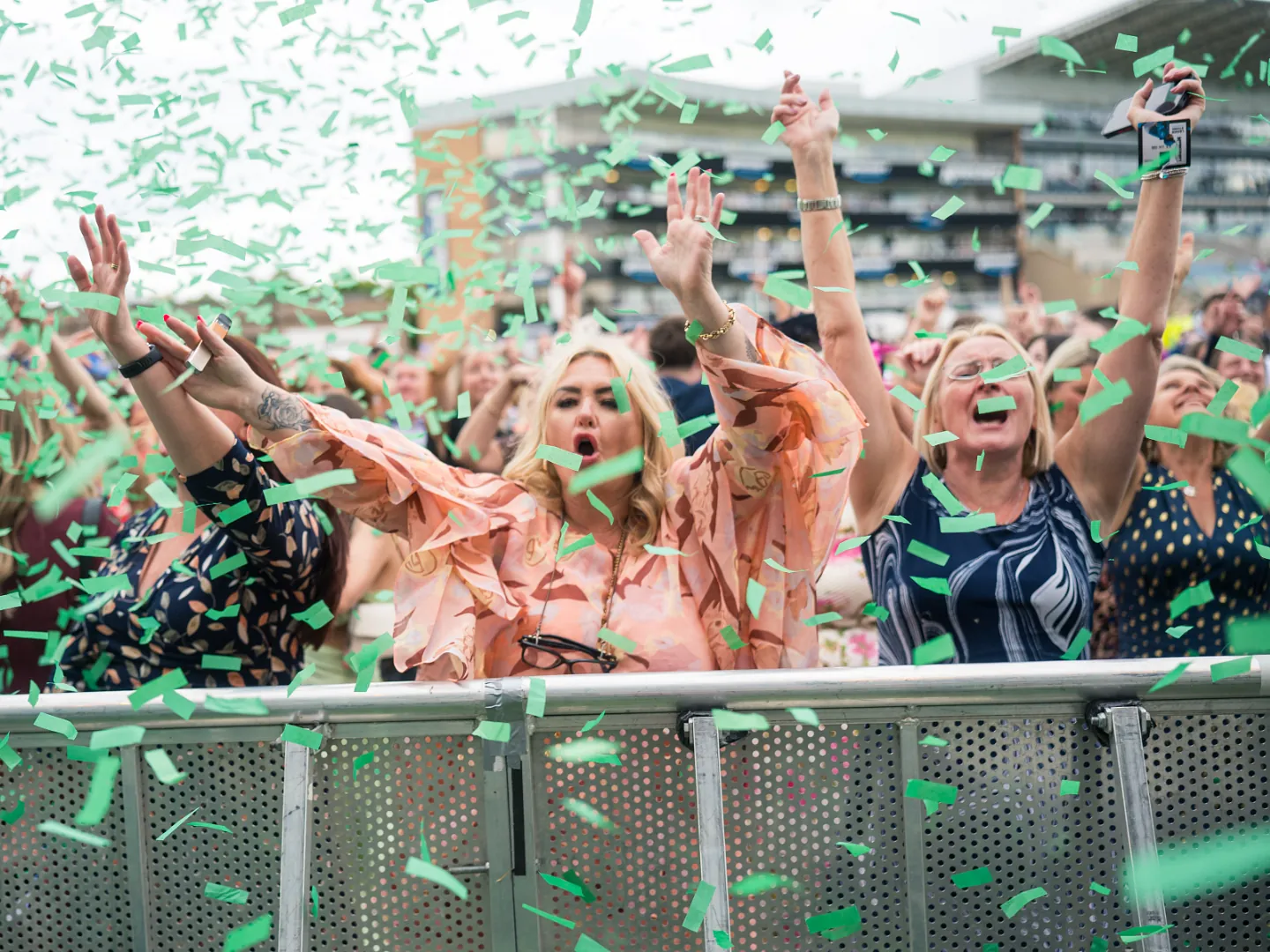 People singing in the crowd at Doncaster Racecourse
