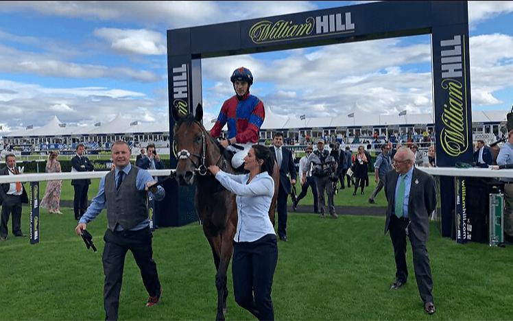 Trainer Hugo Palmer celebrates a win