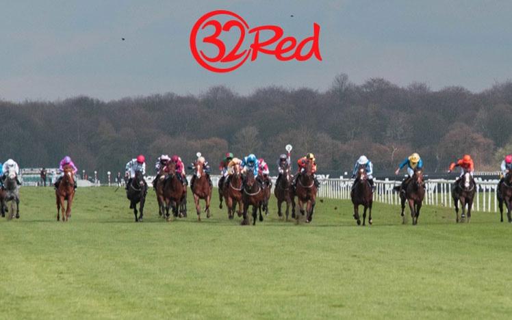 Group of jockeys racing.