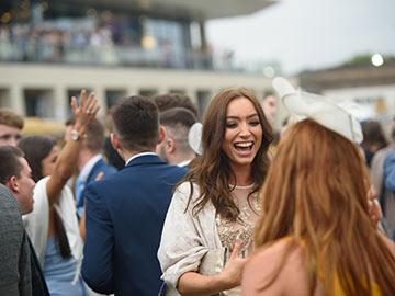 A group of people having fun at Doncaster Racecourse