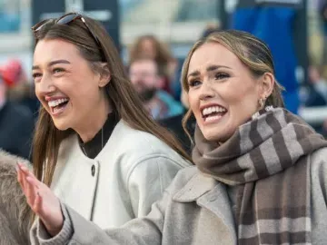 Ladies watching horse racing at Doncaster Racecourse