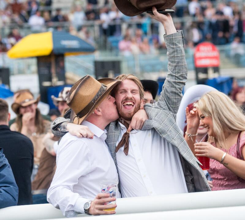Two gents celebrating a win at Doncaster Racecourse