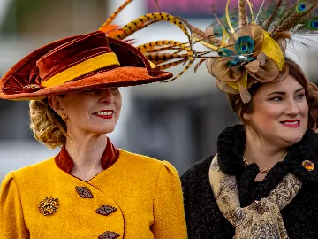 Winter Ladies Day finalists dressed up in winter fashion with large hats, smiling