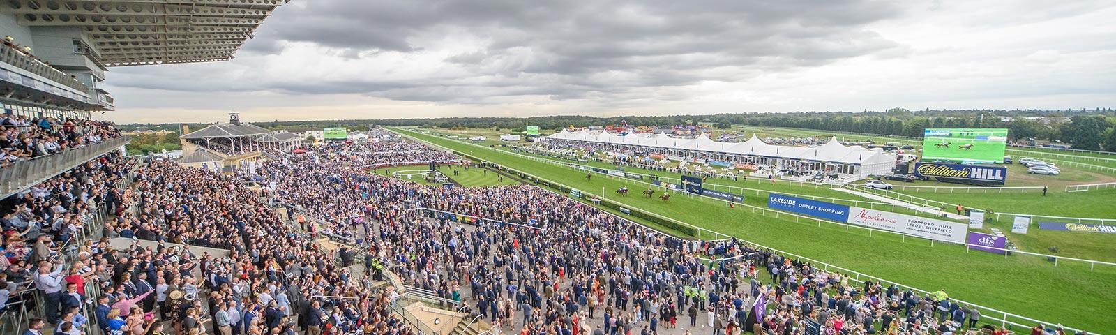 Crowds in the main grandstand at Doncaster Racecourse