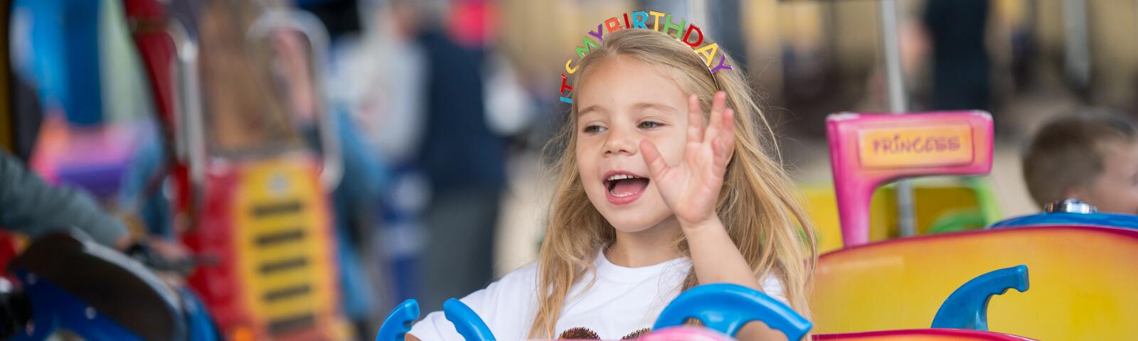 Child on a ride at Doncaster Racecourse on a family funday
